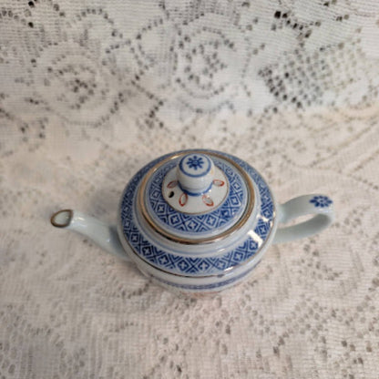 Vintage Blue &amp; White Miniature Porcelain Teapot with Matching Saucer